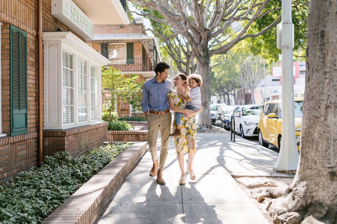 Family walking on the sidewalk